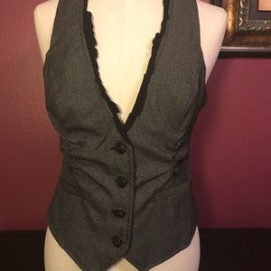 Gray vest.